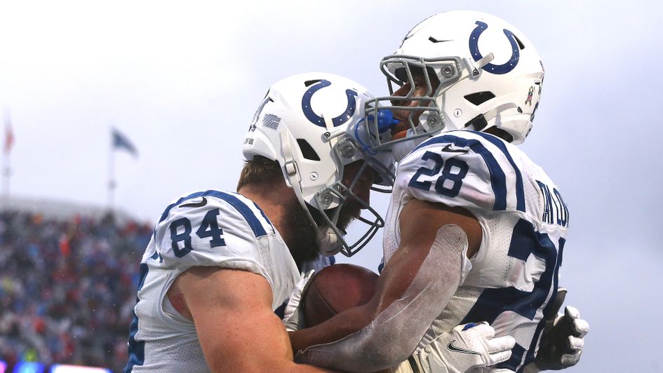 Jonathan Taylor of the Indianapolis Colts celebrates a touchdown with Jack Doyle