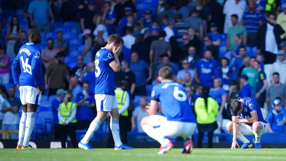 Everton players look dejected after their stunning defeat