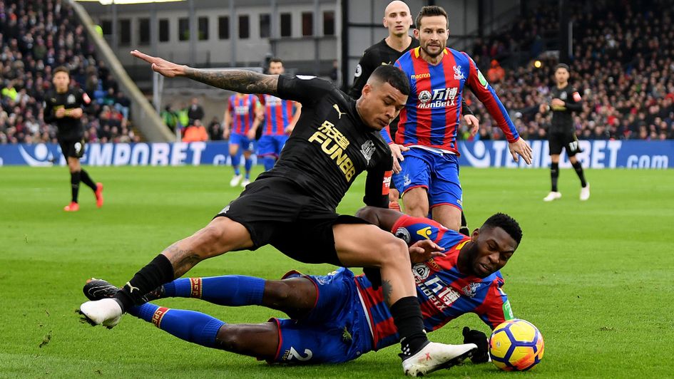 Kenedy is tackled by Timothy Fosu-Mensah