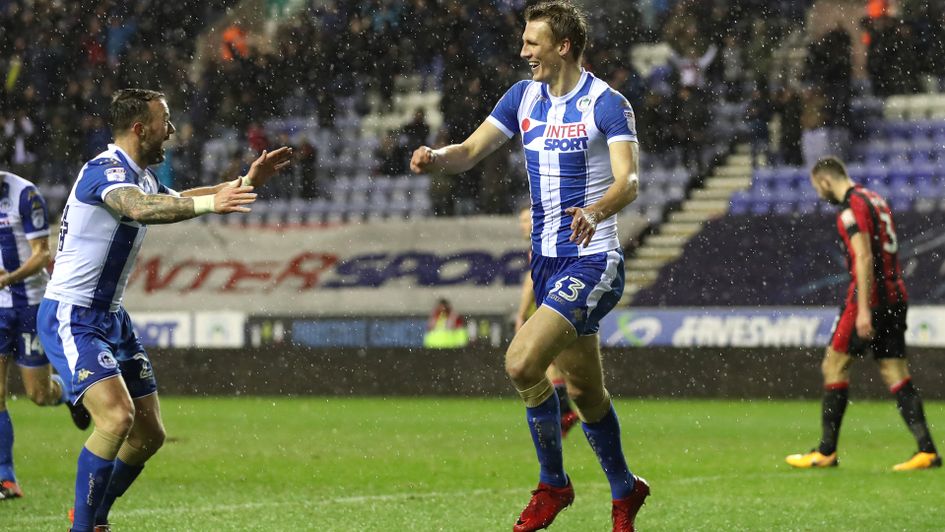 Dan Burn celebrates his goal for Wigan against Bournemouth