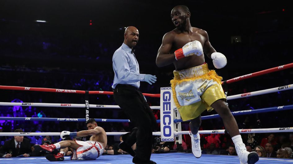 Amir Khan is knocked down by Terence Crawford