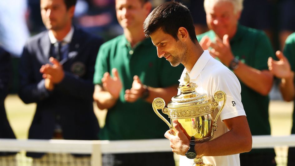 Novak Djokovic with the Wimbledon trophy