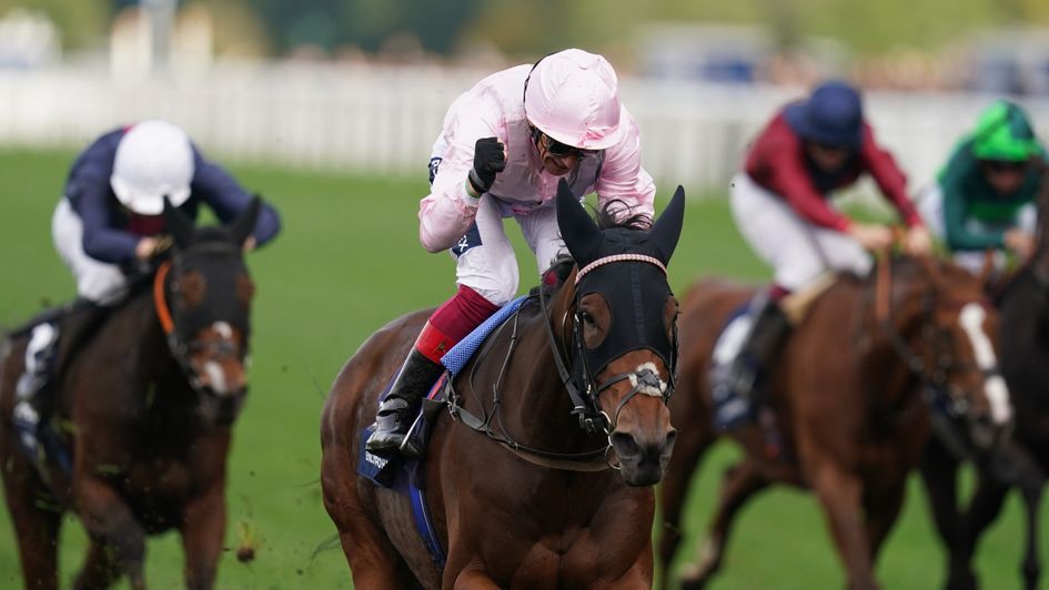 Frankie Dettori celebrates Emily Upjohn's victory