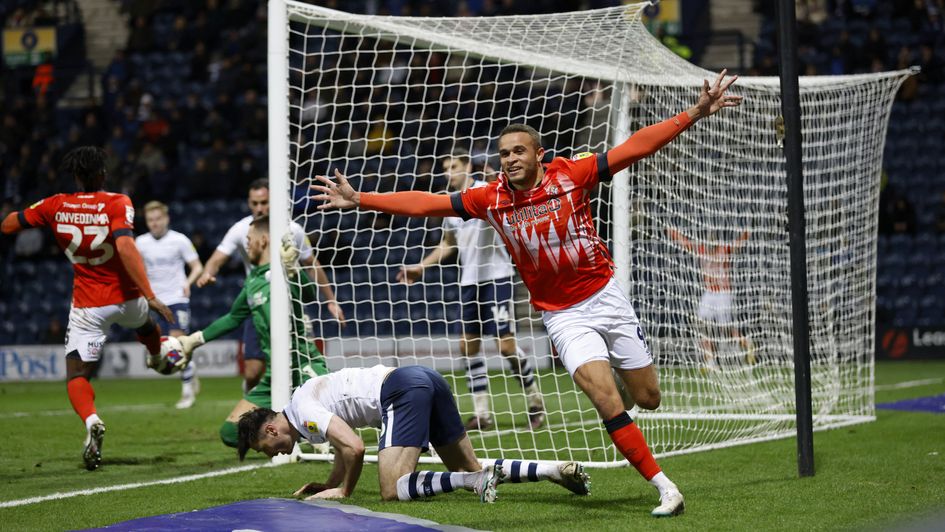 Carlton Morris celebrates a goal for Luton