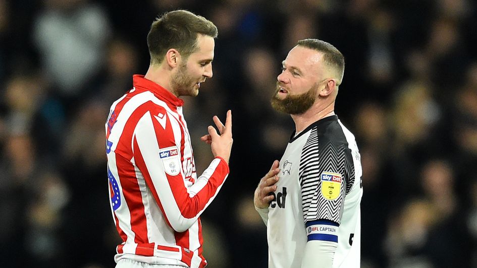 Nick Powell: Stoke forward catches up with former Man United team-mate Wayne Rooney (right)