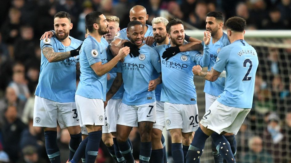 Raheem Sterling celebrates scoring for Manchester City