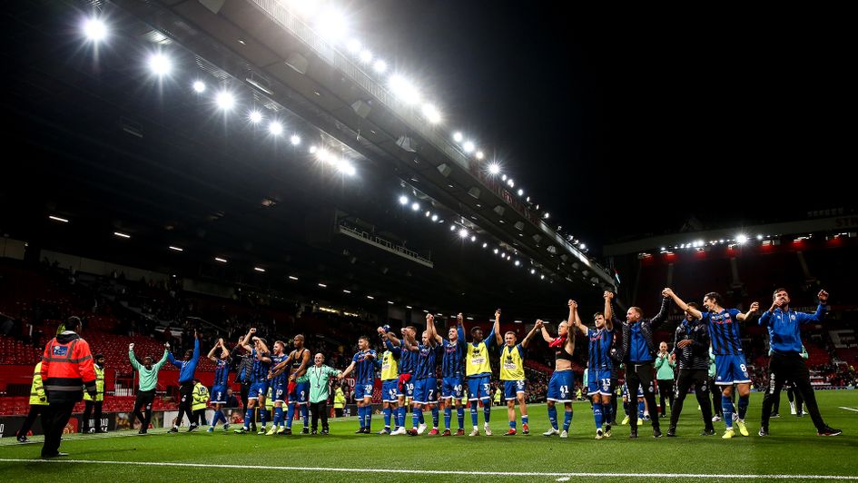 Rochdale players after their Carabao Cup game against Manchester United