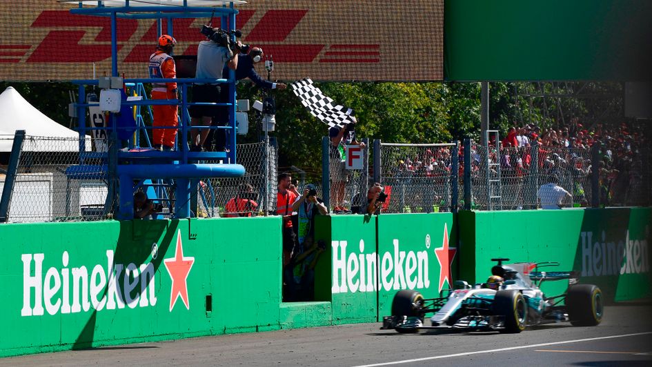 Lewis Hamilton takes the chequered flag at Monza