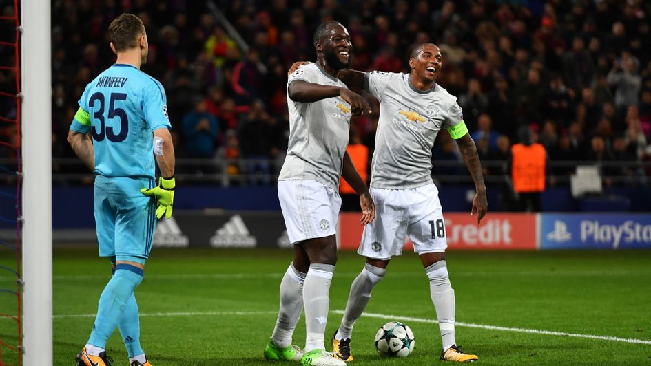 Romelu Lukaku and Anthony Martial celebrate United's third