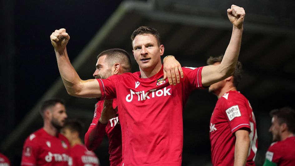 Paul Mullin celebrates a goal for Wrexham