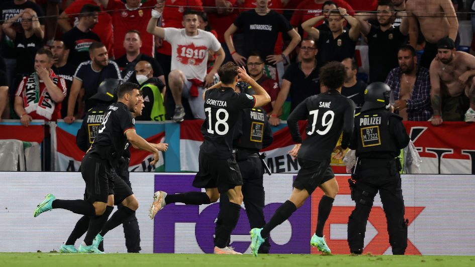 Leon Goretzka celebrates his vital goal in front of the Hungary fans