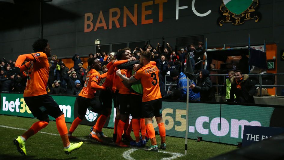 Barnet's Dan Sparkes celebrates with his team-mates