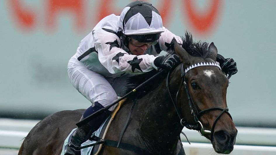 Oscula and Mark Creham win the Woodcote Stakes