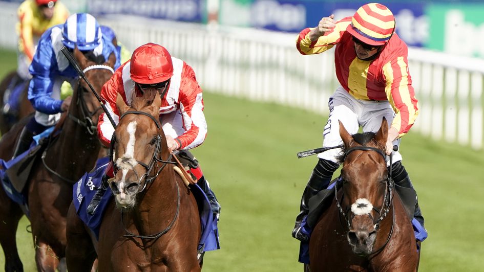 Tom Marquand celebrates Galileo Chrome's win in the Pertemps St Leger