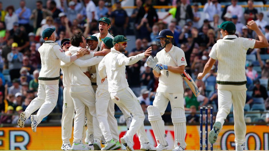 Australia celebrate the Ashes-winning moment