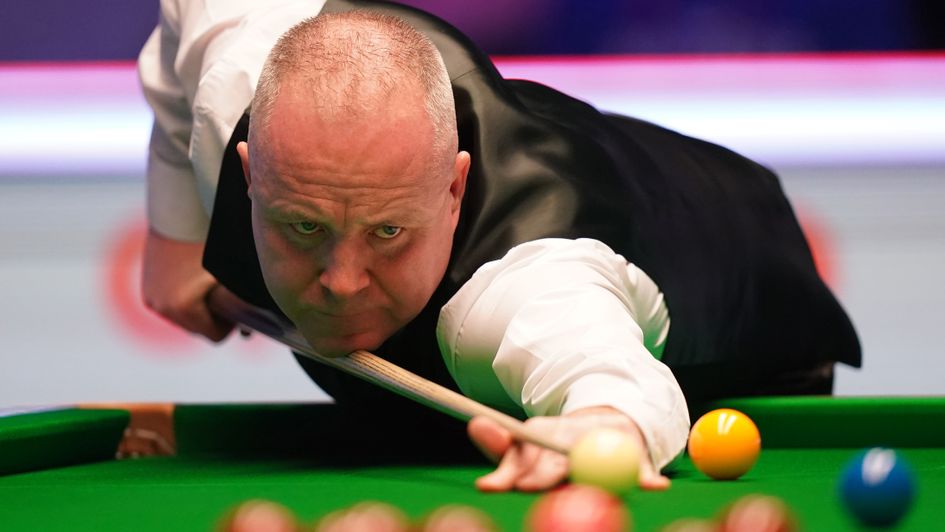 John Higgins got back to winning ways