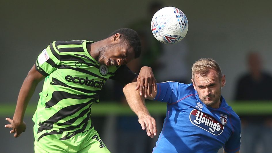 James Hanson (right) looks to win the ball