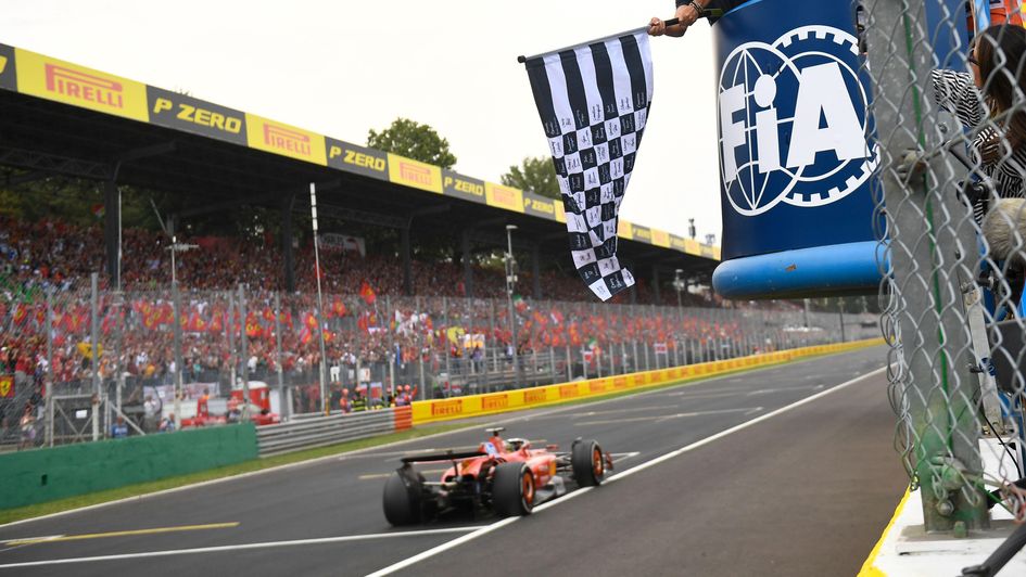 Charles Leclerc crosses the finish line to win the Italian Grand Prix