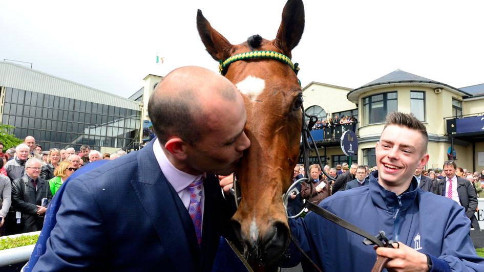 Trainer Adrian Keatley kisses Jet Setting