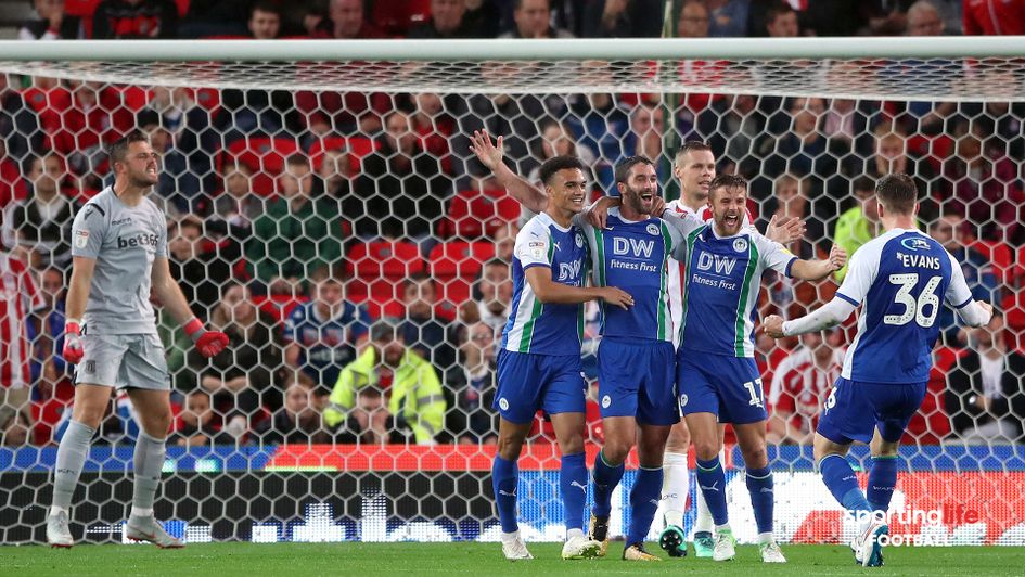 Wigan celebrate taking the lead at Stoke