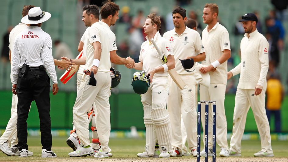 The players shake hands on a draw at the MCG