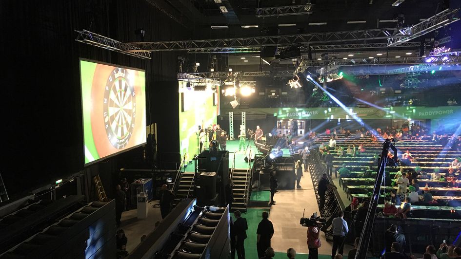 Raymond van Barneveld plays Paddy Power during the interval