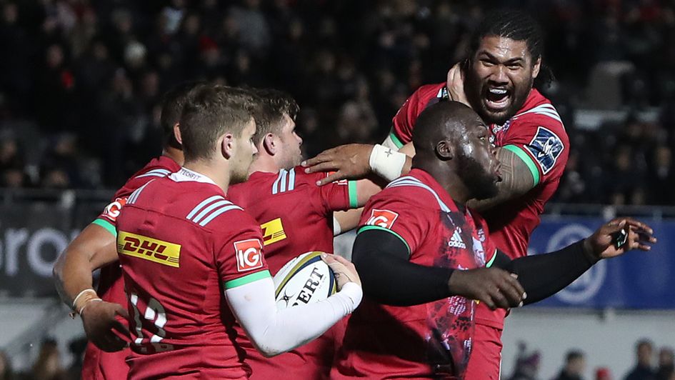 Josh Ibuanokpe (2r) celebrates his crucial late try