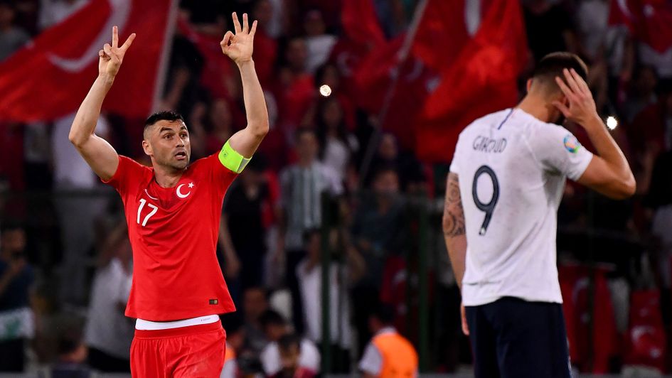 Burak Yilmaz celebrates during Turkey's 2-0 win over France