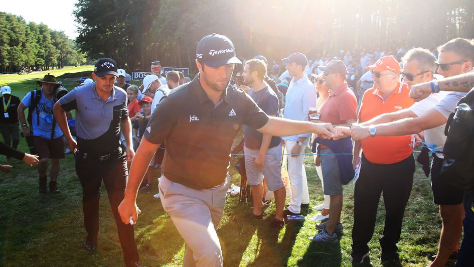 Jon Rahm saved par at the last and shares the lead