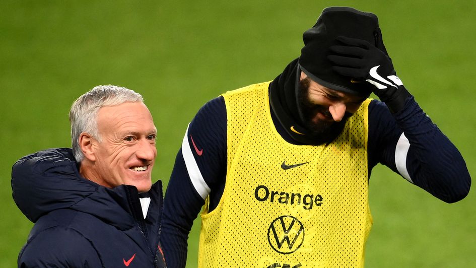 Didier Deschamps (L) and Karim Benzema