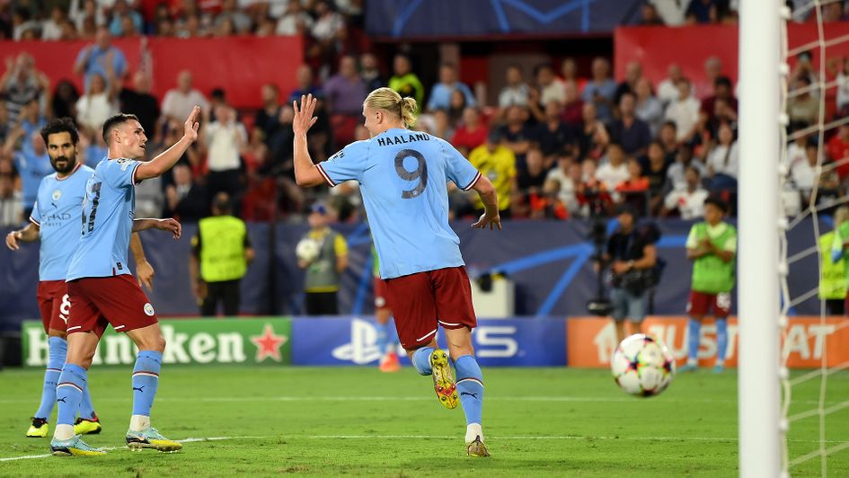 Erling Haaland celebrates a goal against Sevilla