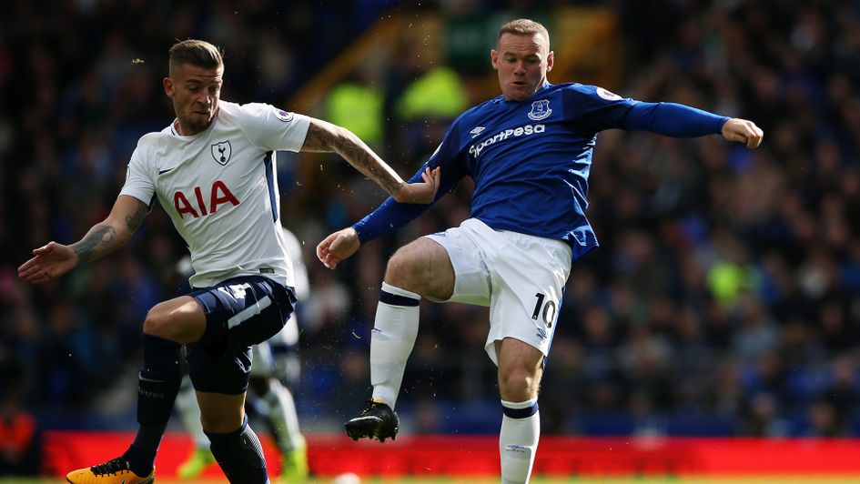 Everton's Wayne Rooney and Toby Alderweireld of Spurs do battle