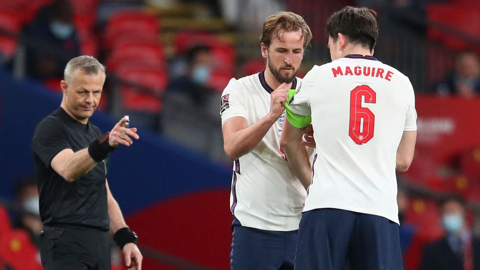 Harry Kane gives Harry Maguire the captain's armband