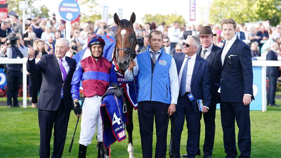 The Coolmore team back in the Leger winners' enclosure