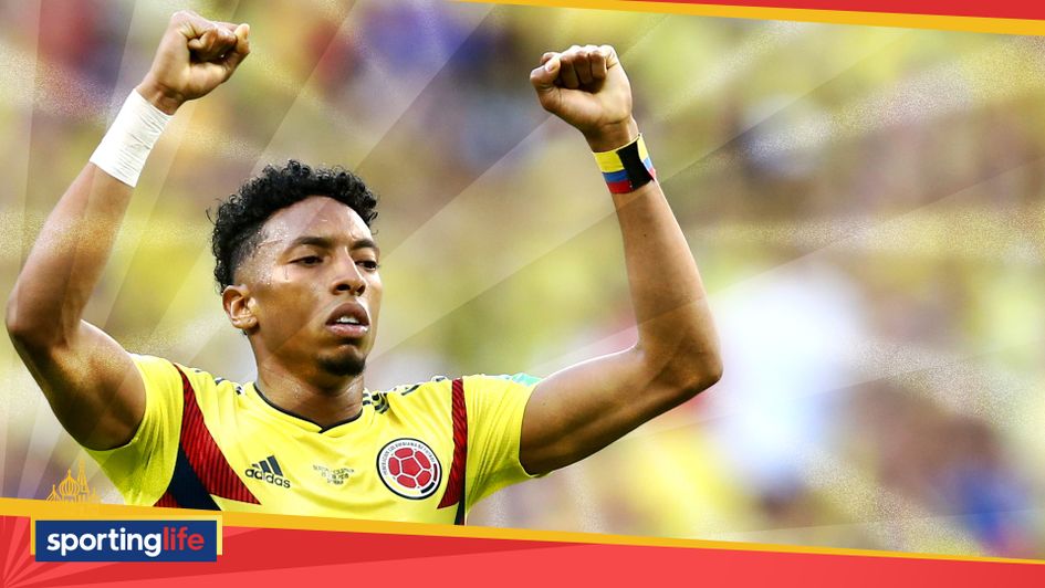 Johan Mojica celebrates after Colombia won Group H on the final matchday