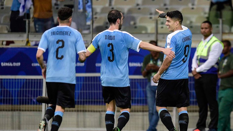 Luis Suarez celebrates with Uruguay team-mates at the Copa America