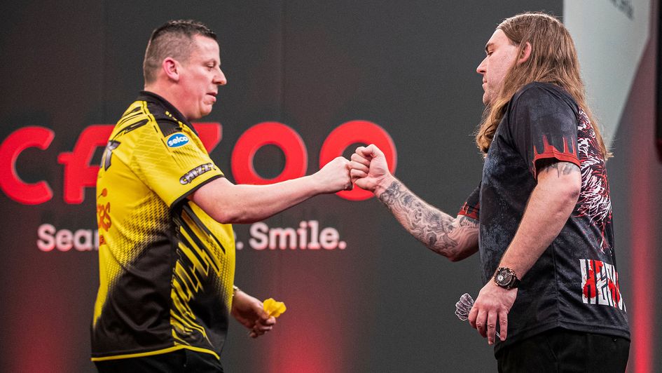 Dave Chisnall and Ryan Searle (Picture: Taylor Lanning/PDC)