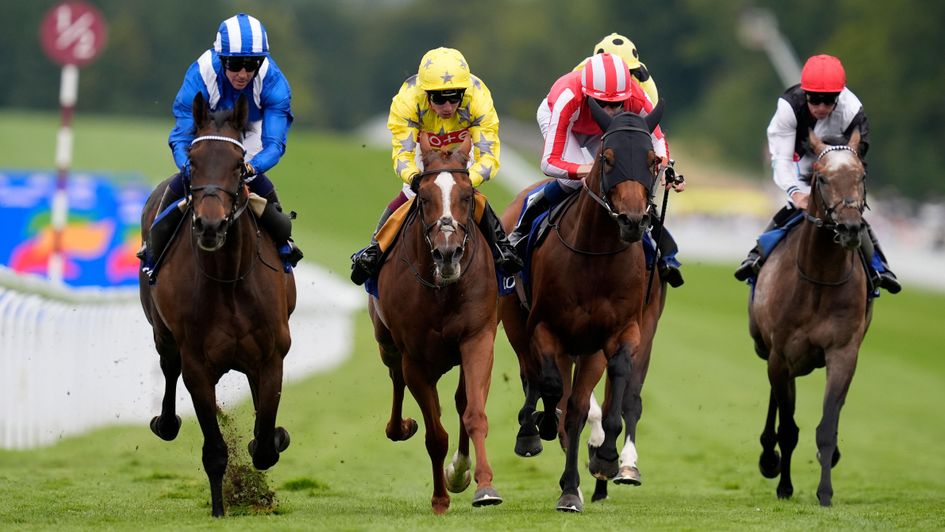 Al Aasy (left) sweeps through to win