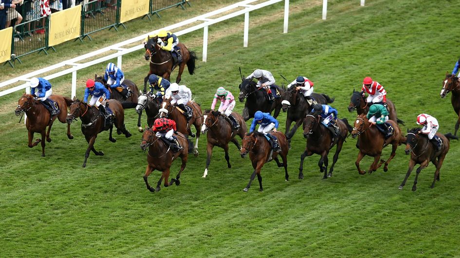 Snoano (red silks) wins the Wolferton