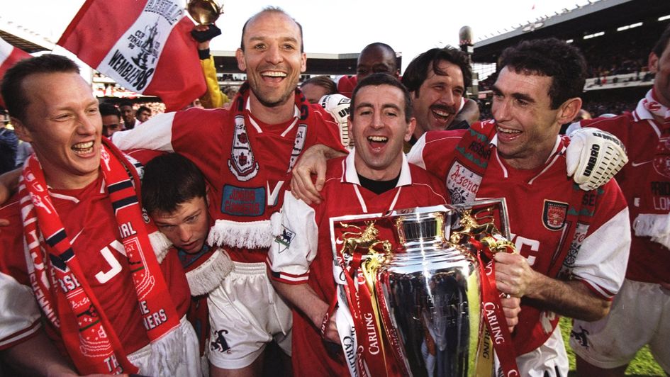 Nigel Winterburn (second from right) celebrates after winning the Premier League with Arsenal in 1998