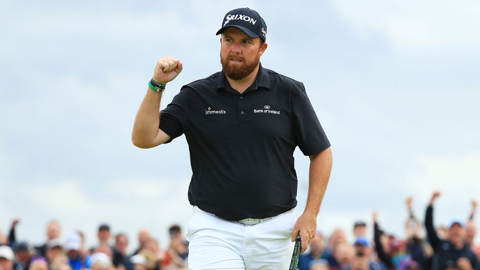 Shane Lowry celebrates his birdie on the 15th green