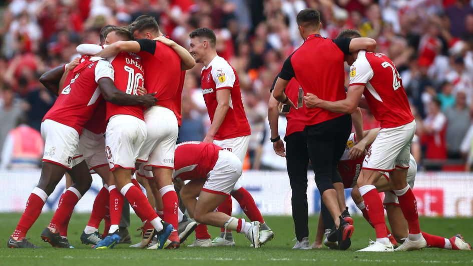 Rotherham players celebrate achieving promotion to the Sky Bet Championship