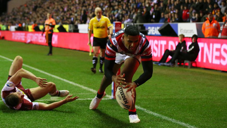 Daniel Tupou touches the ball down in the World Club Challenge