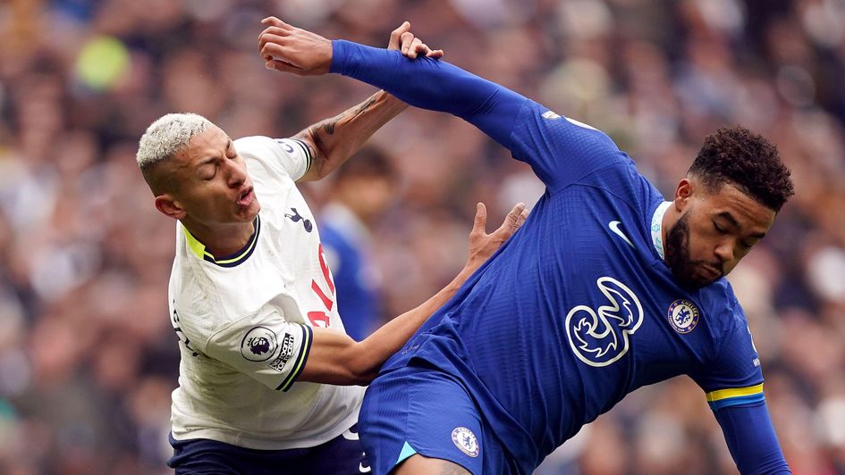 Richarlison and Reece James battle for the ball