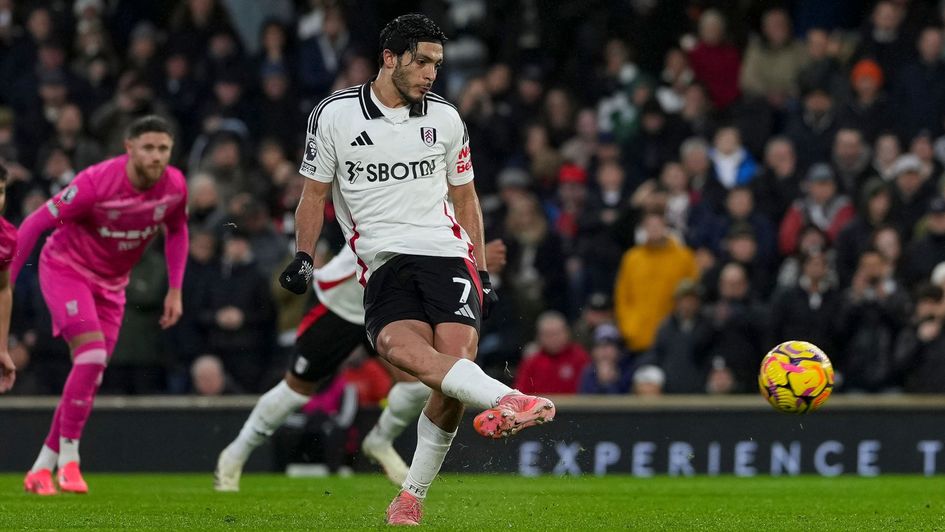 Raúl Jiménez of Fulham scores from the penalty spot, 2-2