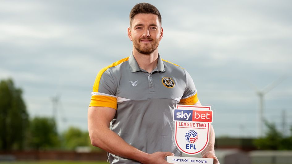 Joe Day with the Sky Bet League Two Player of the Month award for April