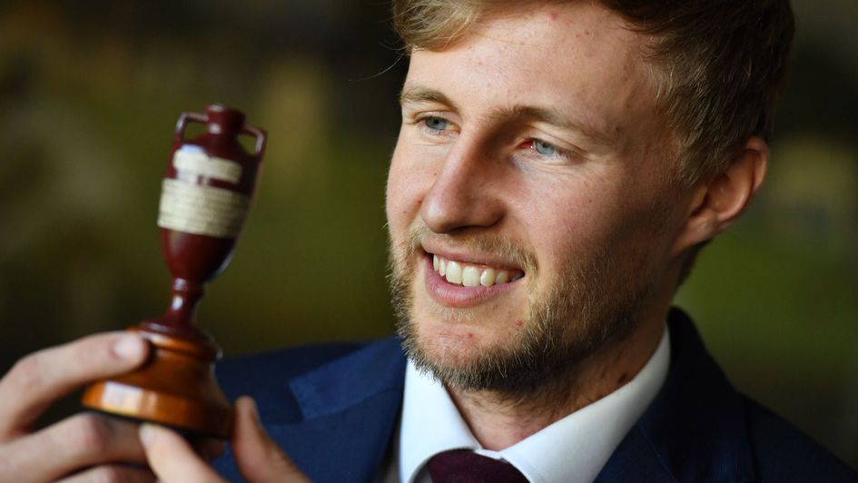 Joe Root with the Ashes urn