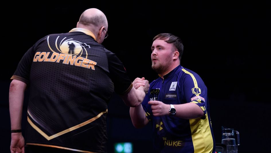 Andrew Gilding and Luke Littler (Picture: Kelly Deckers/PDC)