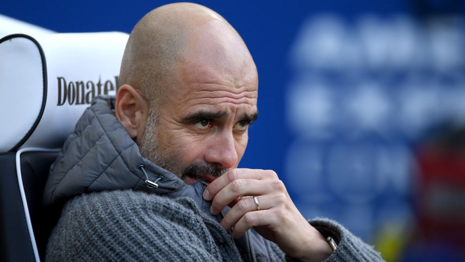 Pep Guardiola watches his Man City players prepare for their title decider at Brighton