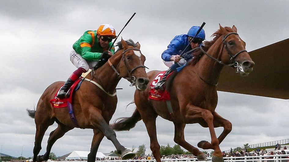 Lone Eagle (nearside) goes agonisingly close in the Irish Derby